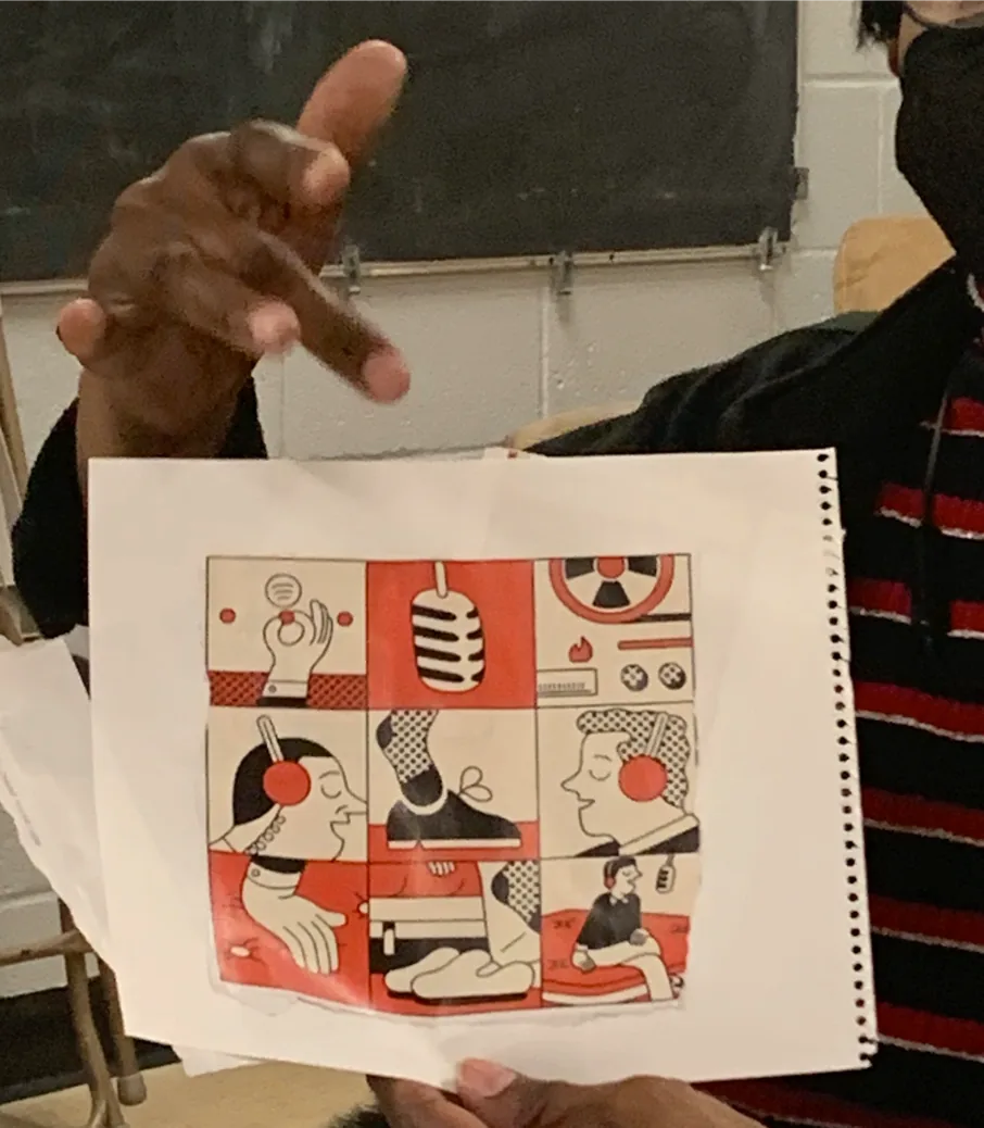 A participant holding their collage
