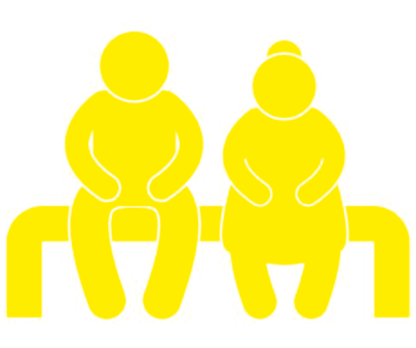 Two older adults seated