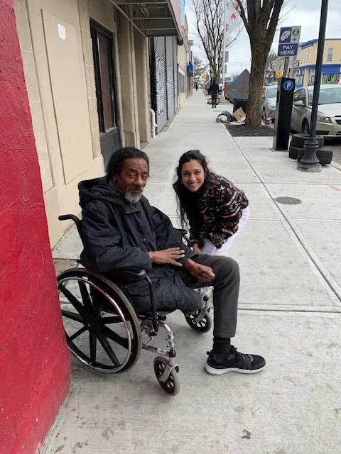Talking with a community member on the street